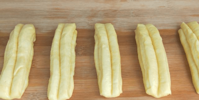 油条怎么做又蓬松又脆又好吃配方 1e37778da7b24fc09dad7b47ba971219.png