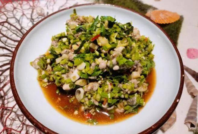 再加入面条,味道销魂~大连街一家著名的粑粑馆,这家店最有名的一道菜