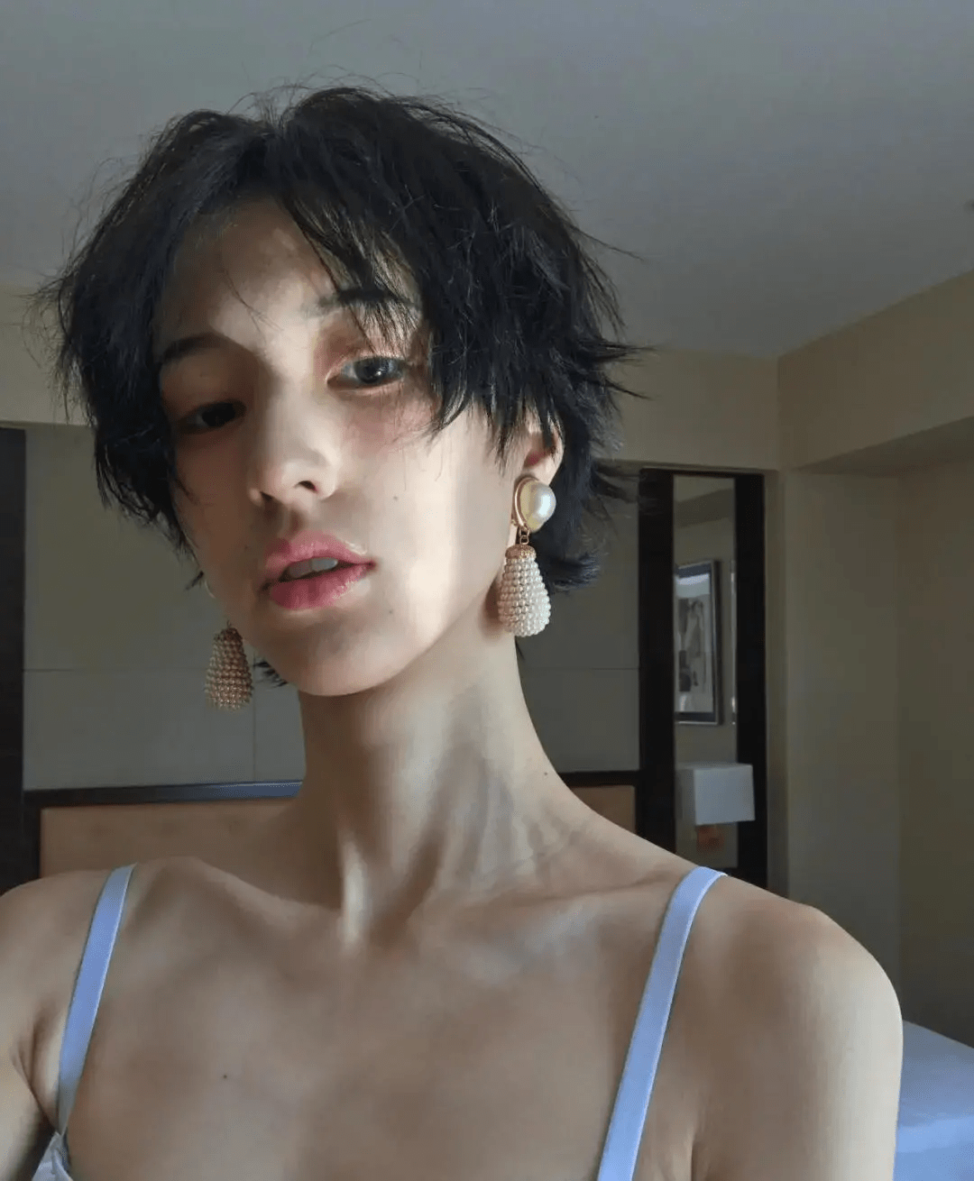 在她身上能看到一种 雌雄莫辨的美