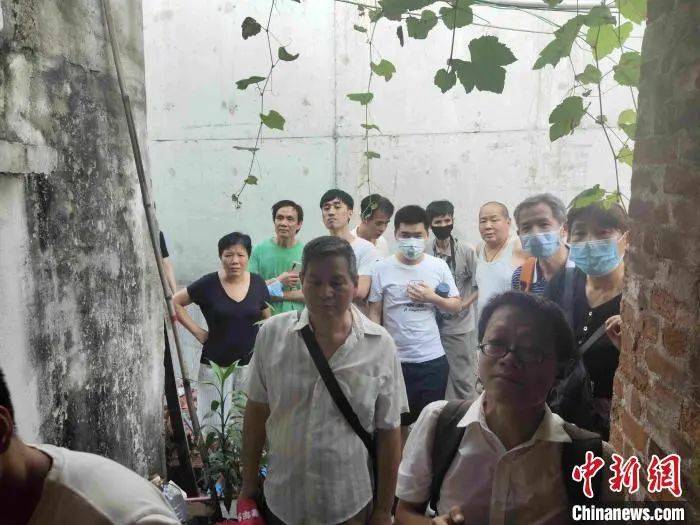 女士|广州“最牛钉子户”现身回应：不搬走不是因为钱