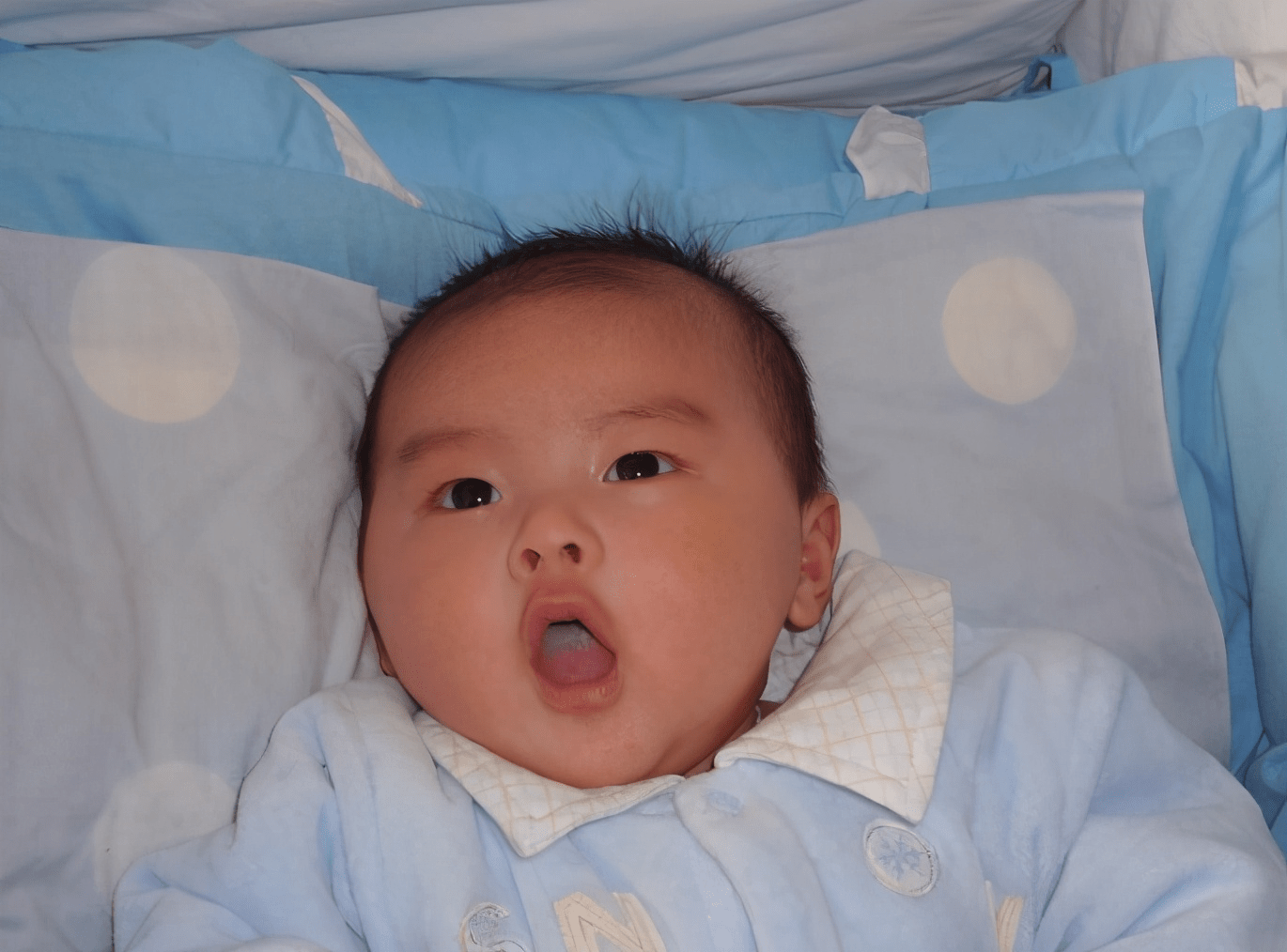 婴儿怎么抱容易入睡 49197cf63d9a477ca475d58dd8b13545.png
