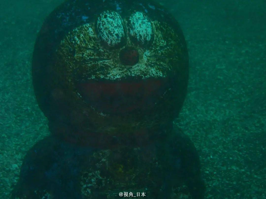 今日趣闻用老相机拍2022年的樱花季海底的哆啦a梦石像等