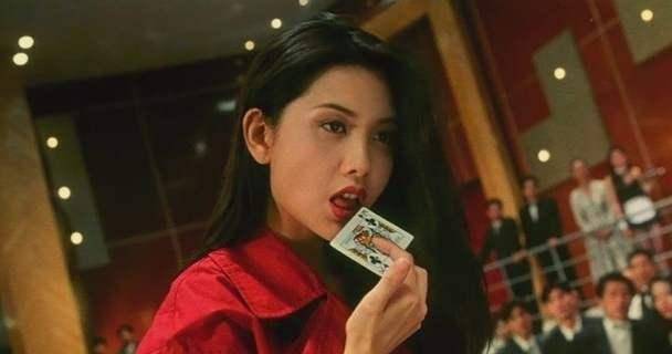 2》影片中的邱淑贞也是凭借一袭红衣牌桌上咬扑克牌的镜头成就了经典