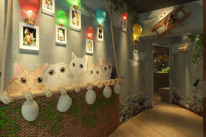 主题咖啡厅墙画装修设计:咖啡厅的墙面上,有着各种各样的猫咪,有可爱