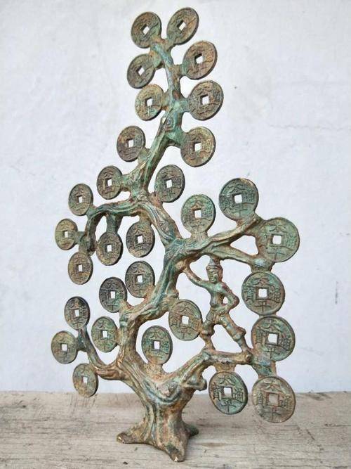 摇钱树是一棵树吗考古学家修复青铜摇钱树重现摇钱树的传说