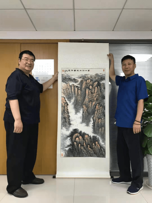 著名书画家周亚华向中国慈善联合总会捐赠作品