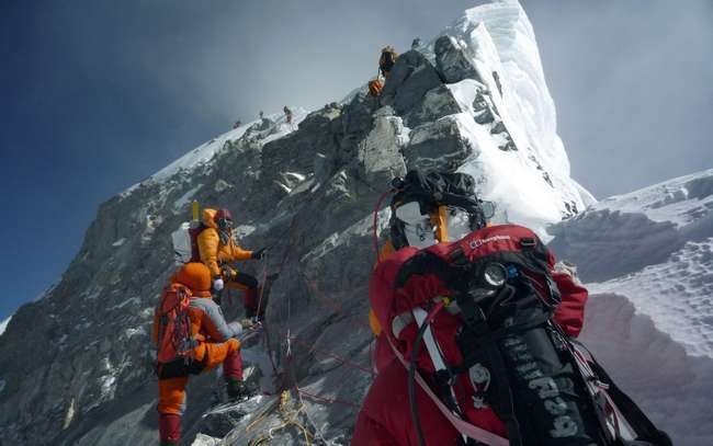 揭秘“绿靴”的真实悲剧故事，留在珠峰的尸体，被登山者用作路标