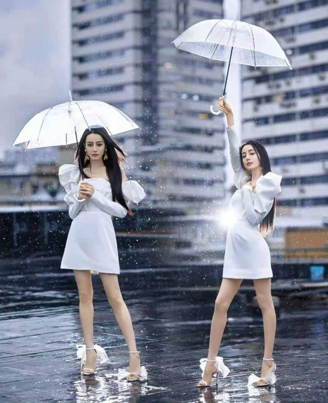 一字型 热巴直接靠脸就能吸粉!穿公主裙秀极品身材,雨中撑伞像拍偶像剧