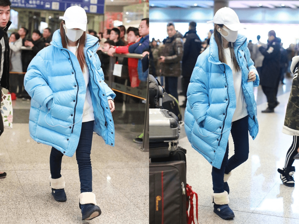 中年人 40岁的李小璐真不像中年人,穿蓝色印花衣如同少女,扮嫩好成功