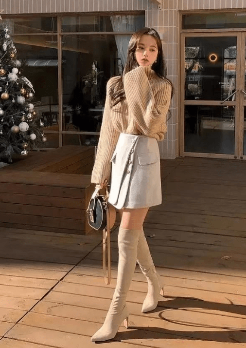 白色最百搭白色的靴子在风格上是最百搭的,他可以适配一切浅色的服饰.