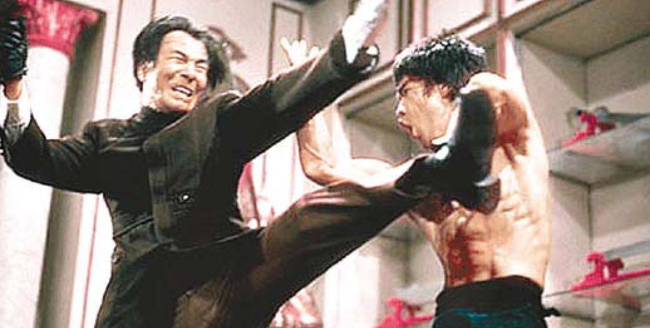 2009年石坚去世曾一拳打伤李小龙为何从影53年却甘当绿叶
