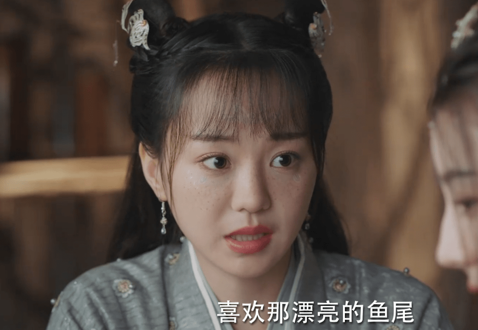 想用他透着青碧色的鱼鳞做成一条麟光裙,自己穿上绝对艳压群芳