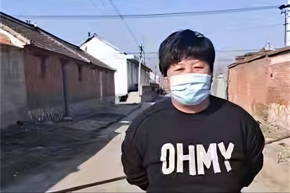 在唐山市丰润区丰登坞镇胡张坨村,由全民参与组建的抗击疫情的队伍里