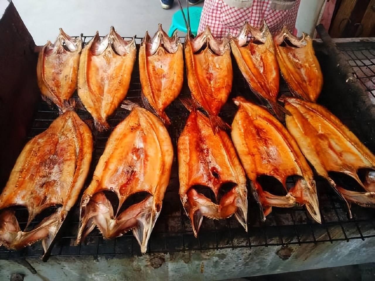 漠河烤狗鱼是黑龙江省大兴安岭地区漠河县的特色美食.