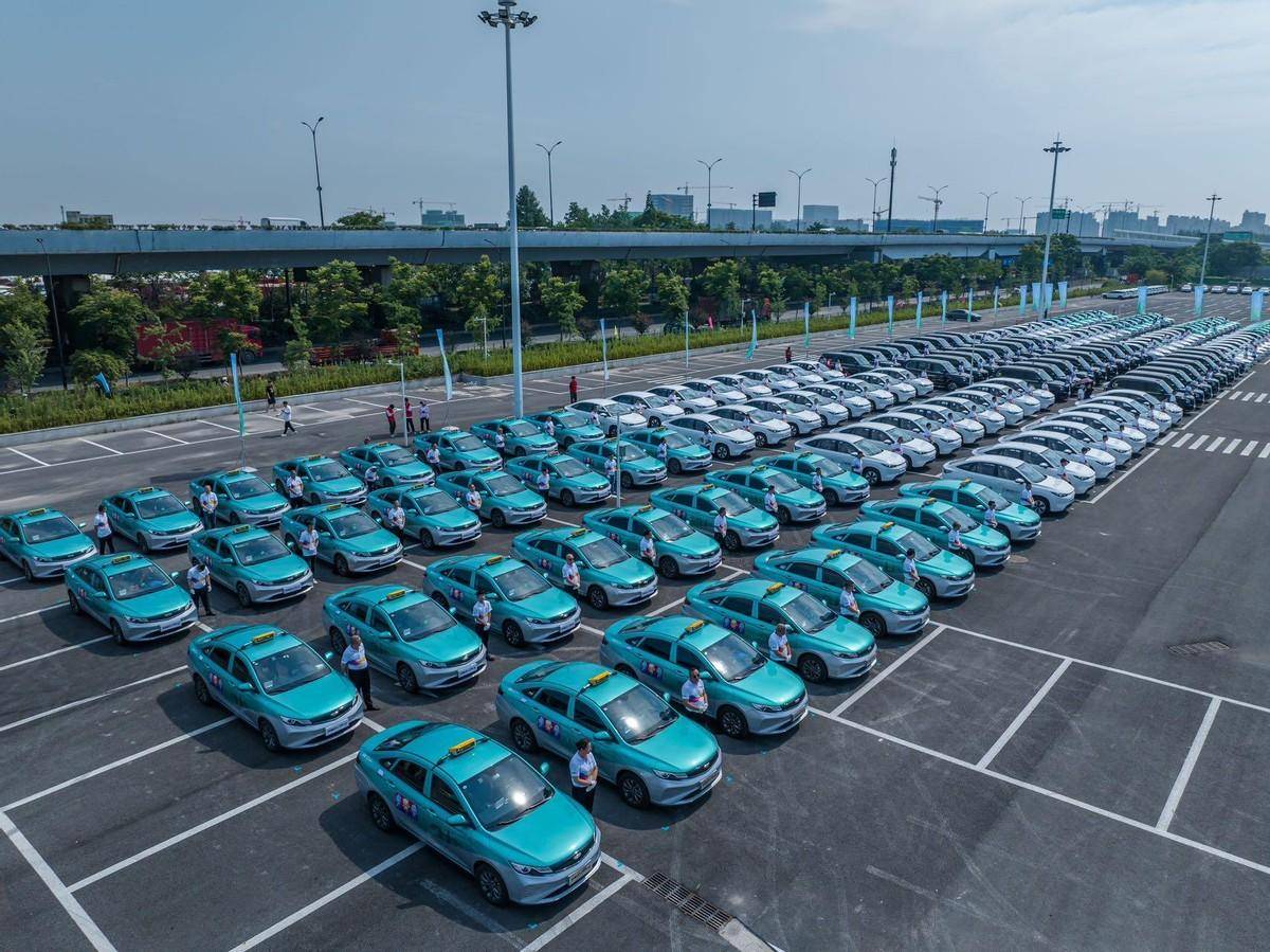 杭州市出租汽车行业喜迎亚运 吉行助亚运 新能源出租车正式交付_搜狐