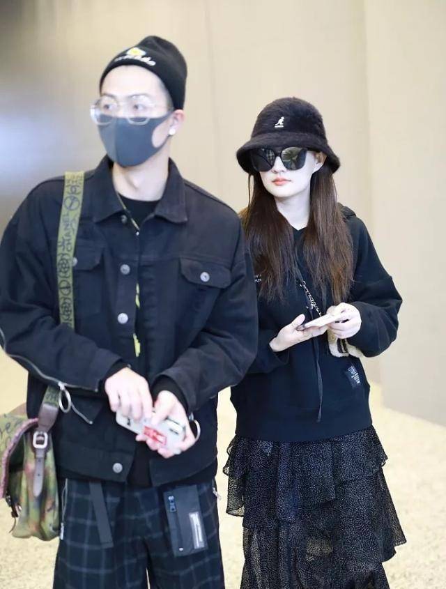 徐璐张铭恩走机场,穿蛋糕裙配渔夫帽,被男友贴心整帽像拍偶像剧_黄色