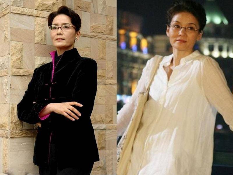 看着68岁潘虹的年龄,我发现:衣着简洁大方,头发微卷,老了又优雅_女性