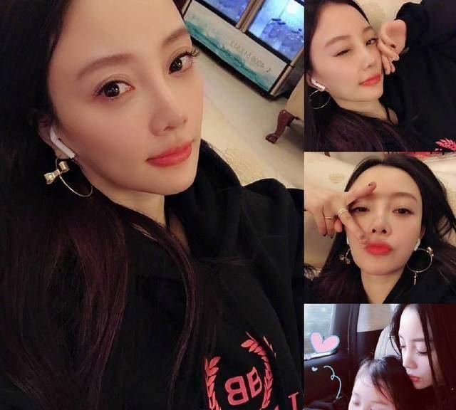 李小璐抱甜馨,摆出pgone招牌手势,晒诗疑表白:来生,相伴!