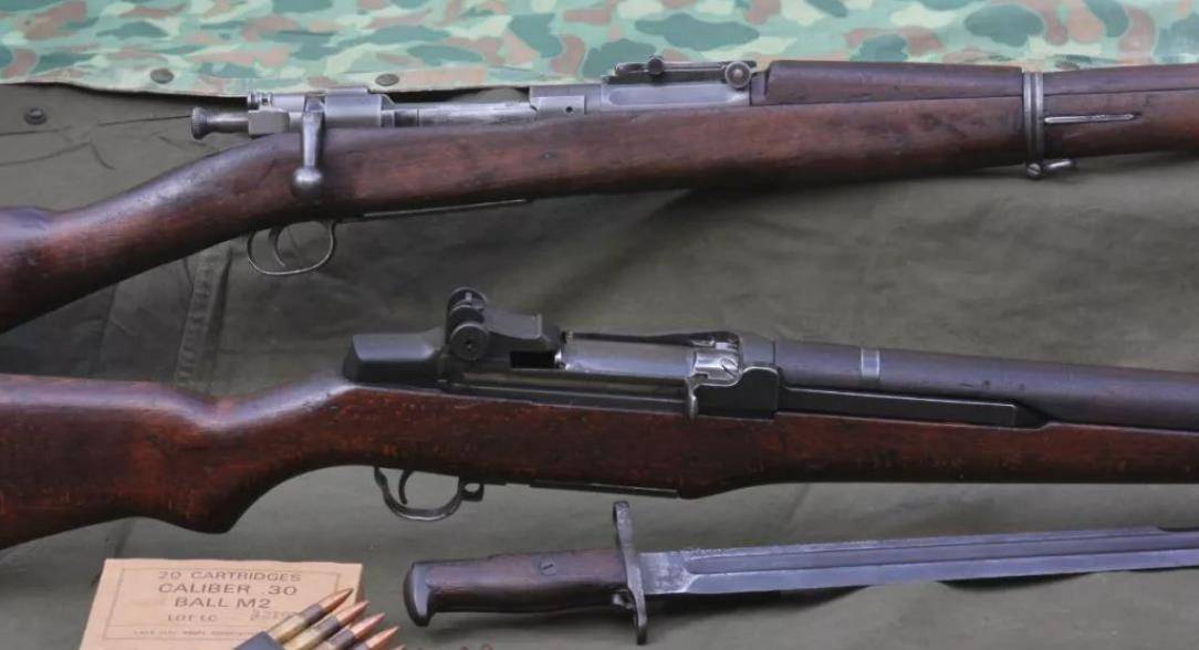 上面是春田步枪,下面是m1加兰德步枪陆战队军士巴斯隆,是美军历史上