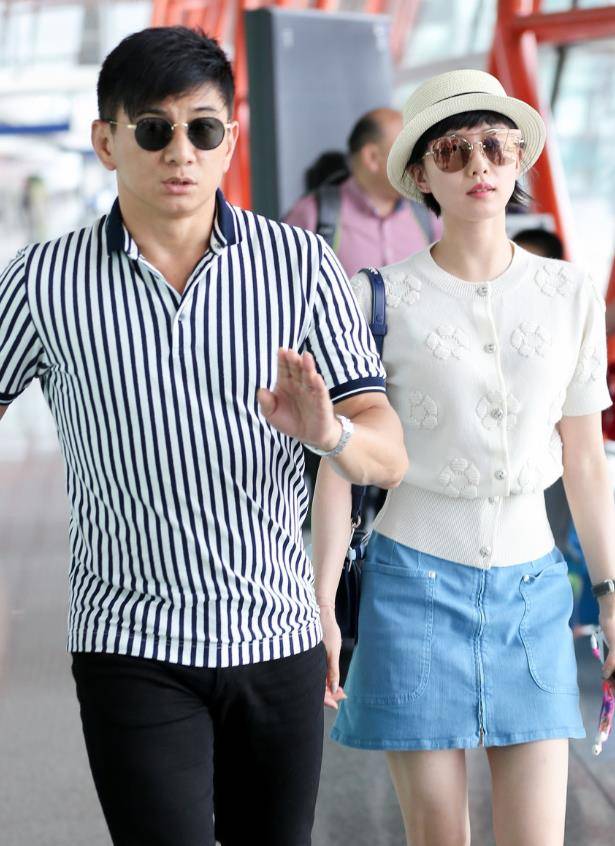 36岁刘诗诗和大17岁吴奇隆走机场,又瘦又会穿,把他熬成微胖大叔_时尚