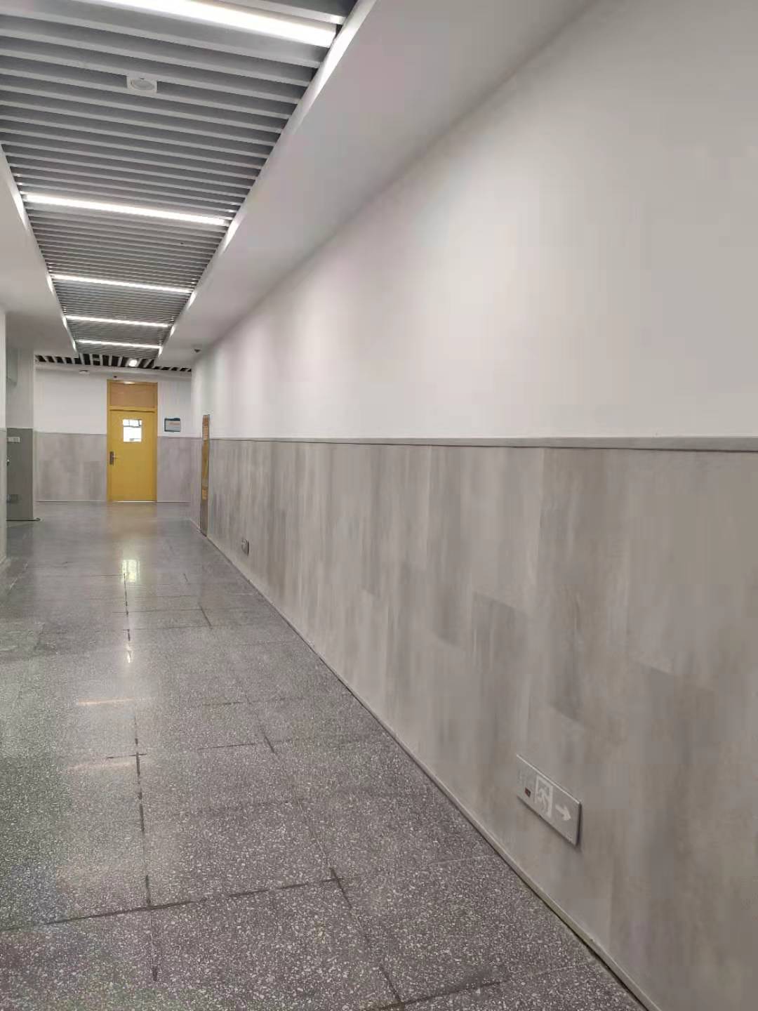 上海普隆实业石塑地板作为学校墙裙装修效果不错