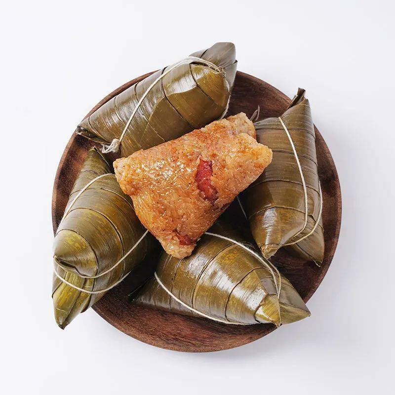 粽子也是承载着海南历史记忆它不仅仅只是一个传统节日里的食品野菠萝