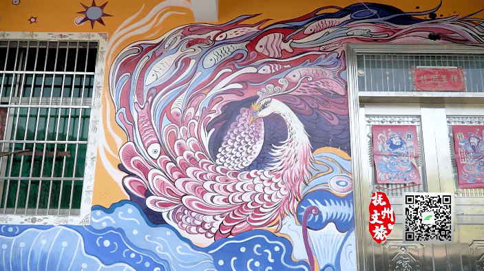 大通彩绘村讲解员 黄克凡:我们村庄画了3333只凤凰,随处可见都是有