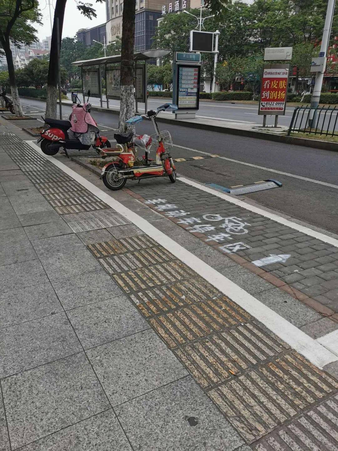 关注| 规范划线让非机动车停放"守规矩"