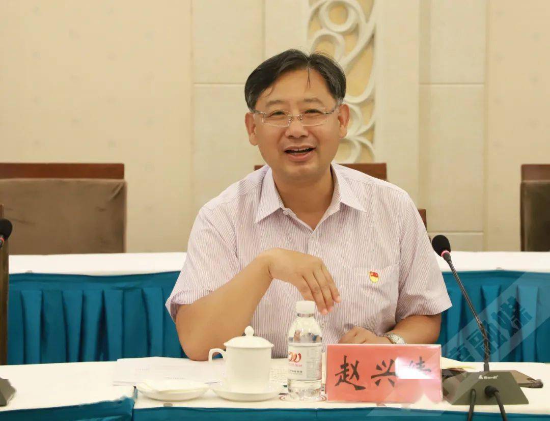 赵兴绩会见唐志成一行