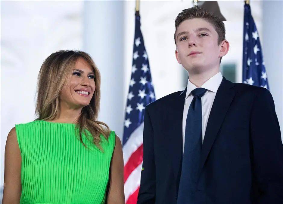 27, us first lady melania trump looks at her son barron trump