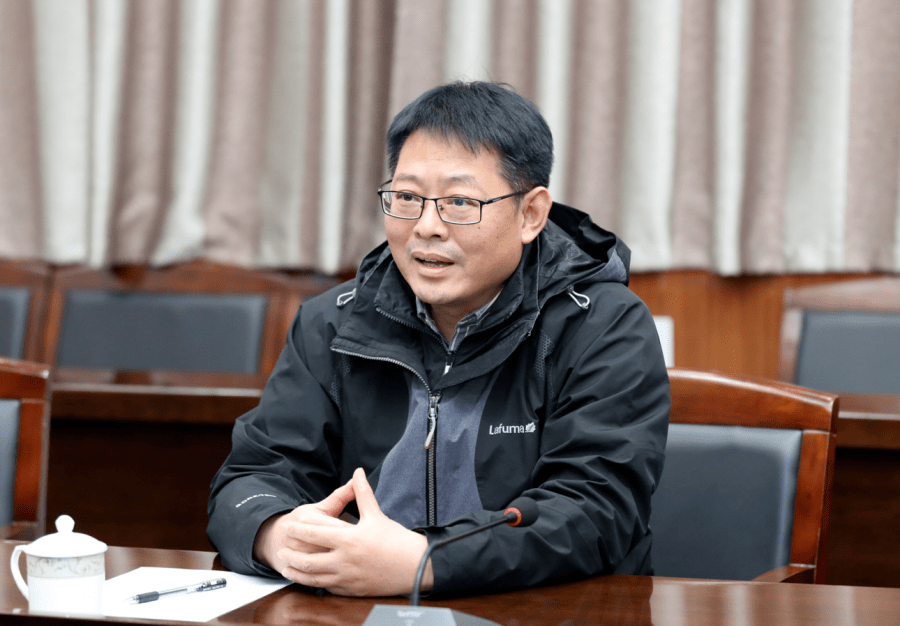 李哲與首建集團山東分公司董事長沈曉峰座談