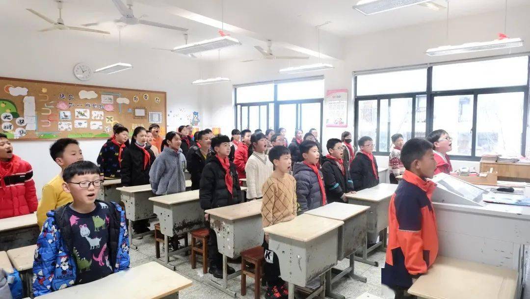 三月春风暖暖吹雷锋精神代代延记浙大教科附属义乌市东河小学雷锋日