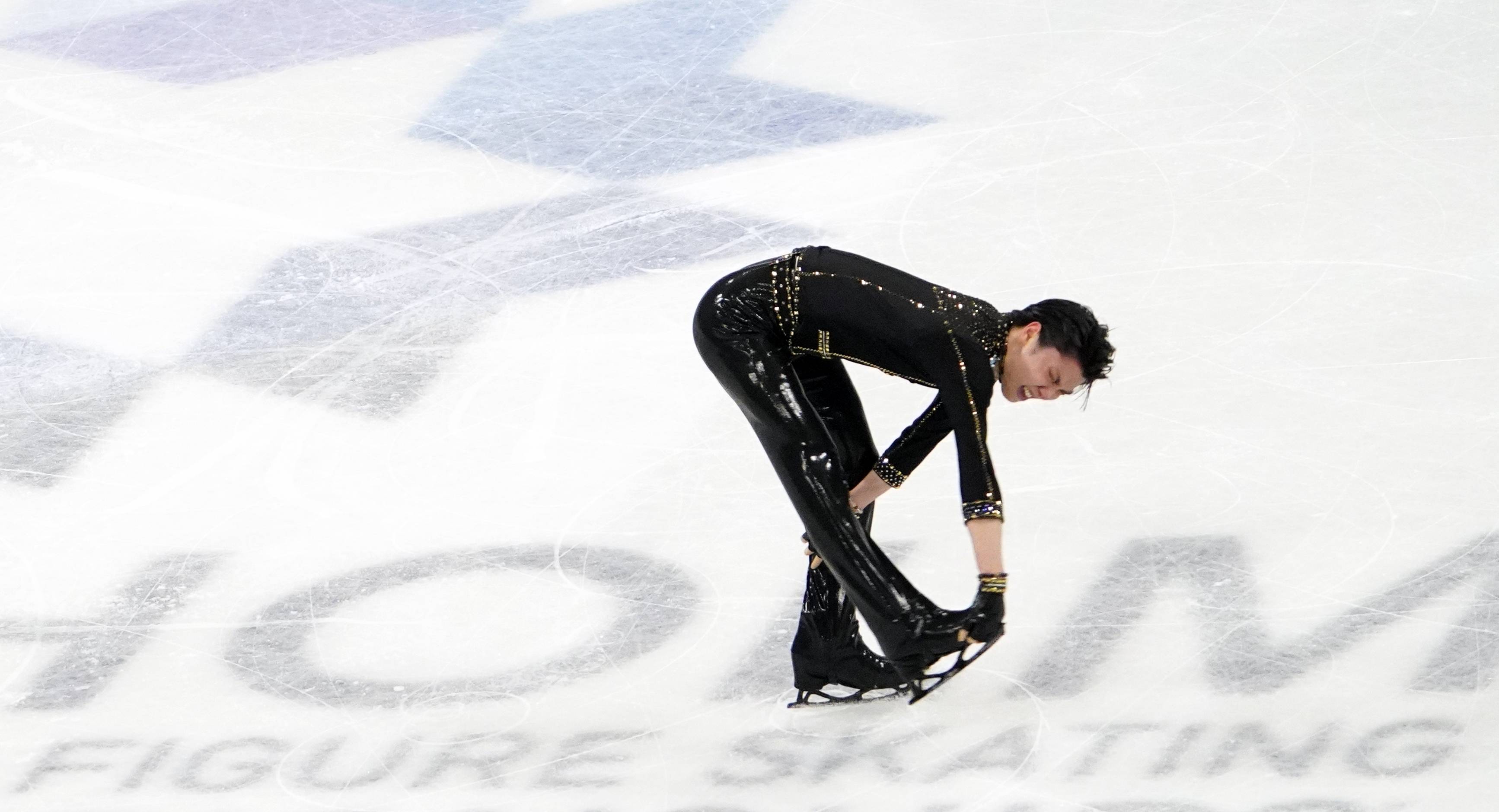 新华社照片,外代,2021年3月26日 3月25日,日本选手羽生结弦在男单短