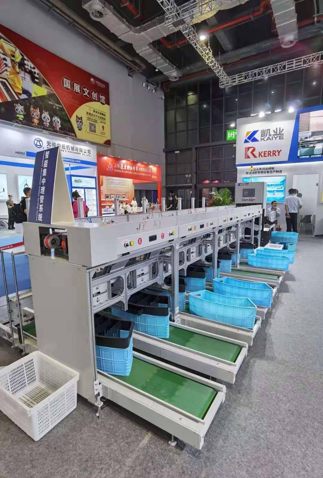 现场减少用工提高效率凯业络筒智能上纱系统实现自动上纱