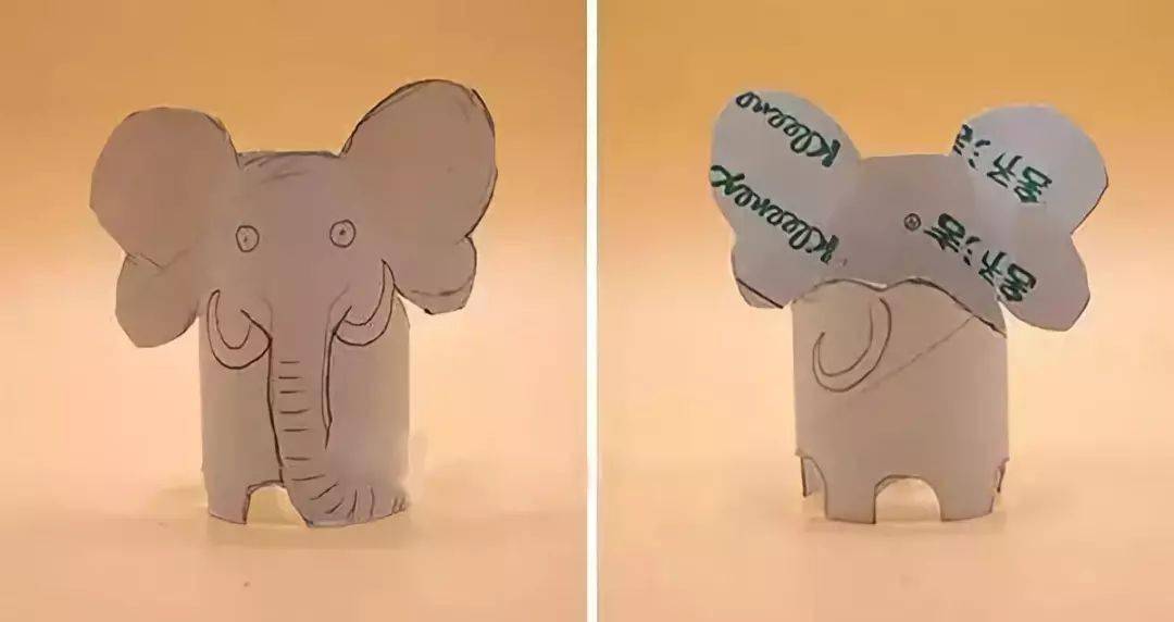 用灰色丙烯颜料进行涂色,涂出粉色的耳朵,大象的眼睛,象牙及鼻子上的