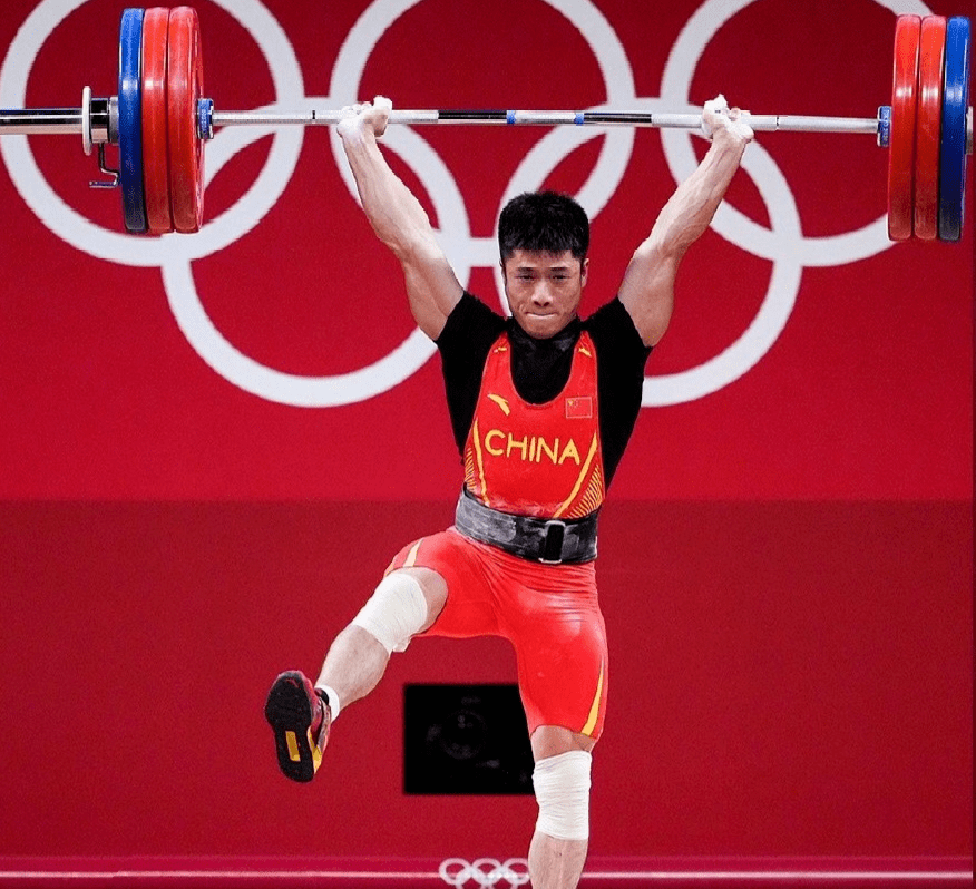 举重若什么成语_举重卡通图片(4)