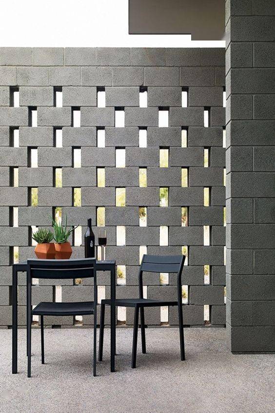 石砖做客厅沙发背景墙,留洞偷光,邻居看了羡慕不已!太实用了