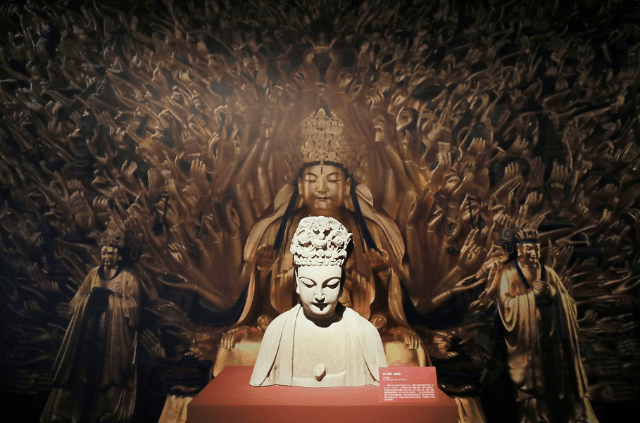 大足石刻特展国博开幕,"镇馆之宝"释迦牟尼佛像展出