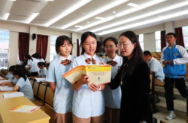 张学军|【图片新闻】洱海湖畔民族花开