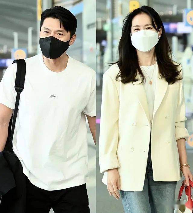 玄彬与孙艺珍结束蜜月回国机场亲密搂抱十分甜蜜