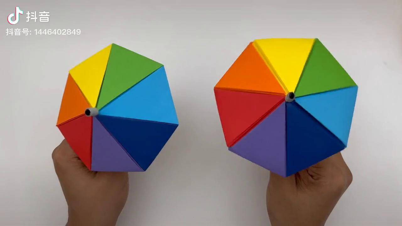 今天我们来折叠一把彩虹伞五颜六色的非常漂亮折纸教程亲子手工手工