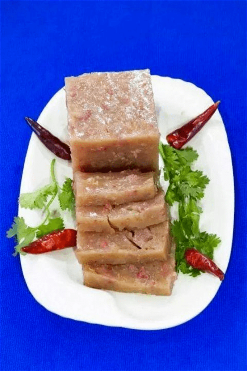 王亚青摄西河肉糕起源于深泽县西河村,是深泽县最为著名的小吃烧饼裹