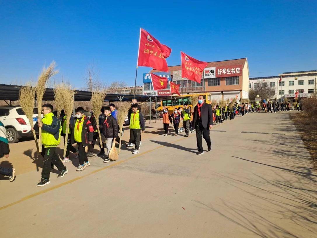 "红领巾心向党,学习雷锋好榜样"学雷锋志愿服务活动——安丘市石堆镇