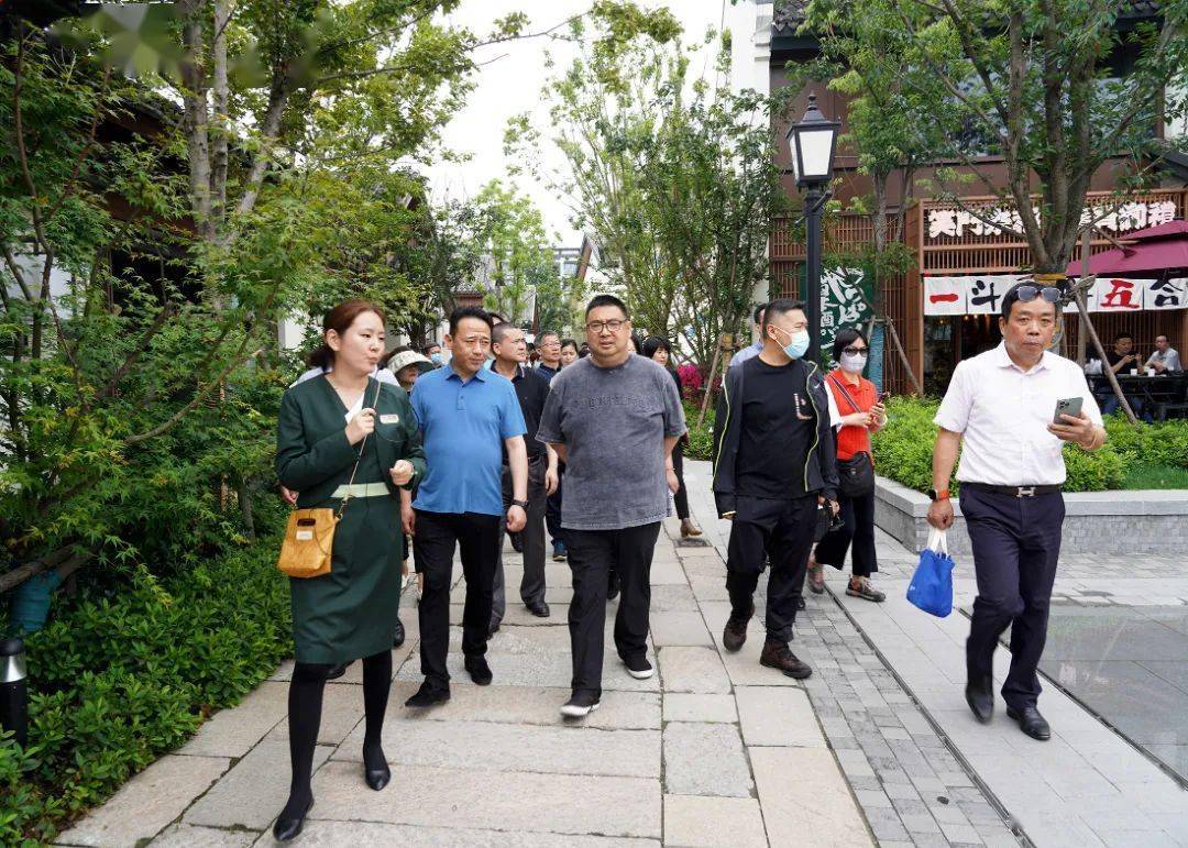 嘉定区新成路街道领导一行来徐考察交流_周志良_社区_项目